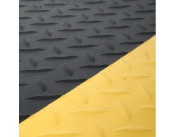 Foto - Černo-žlutá gumová protiúnavová průmyslová laminovaná rohož - 600 x 90 x 1,4 cm