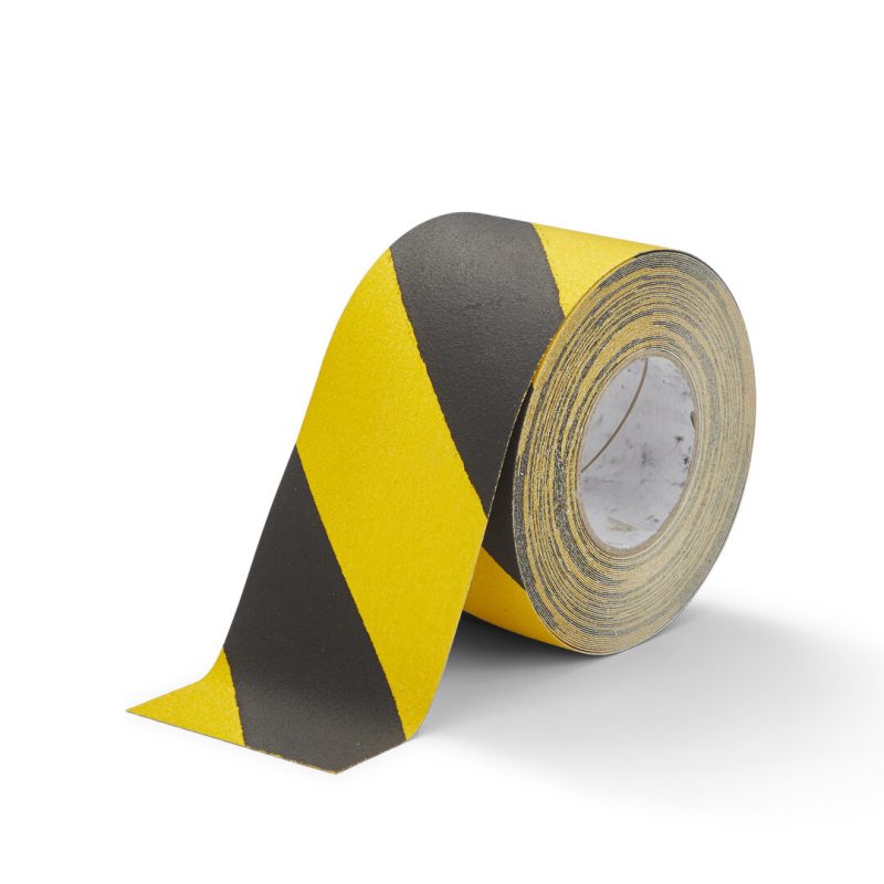 Černo-žlutá korundová snímatelná protiskluzová páska FLOMA Hazard Standard Removable - 18,3 m x 10 cm a tloušťka 0,7 mm (cena za 1 ks)